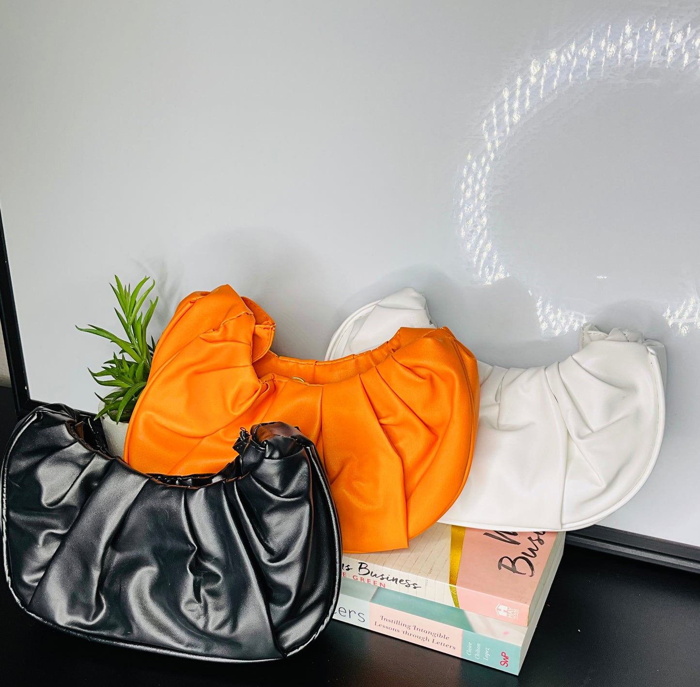 crescent-shaped hobo bag