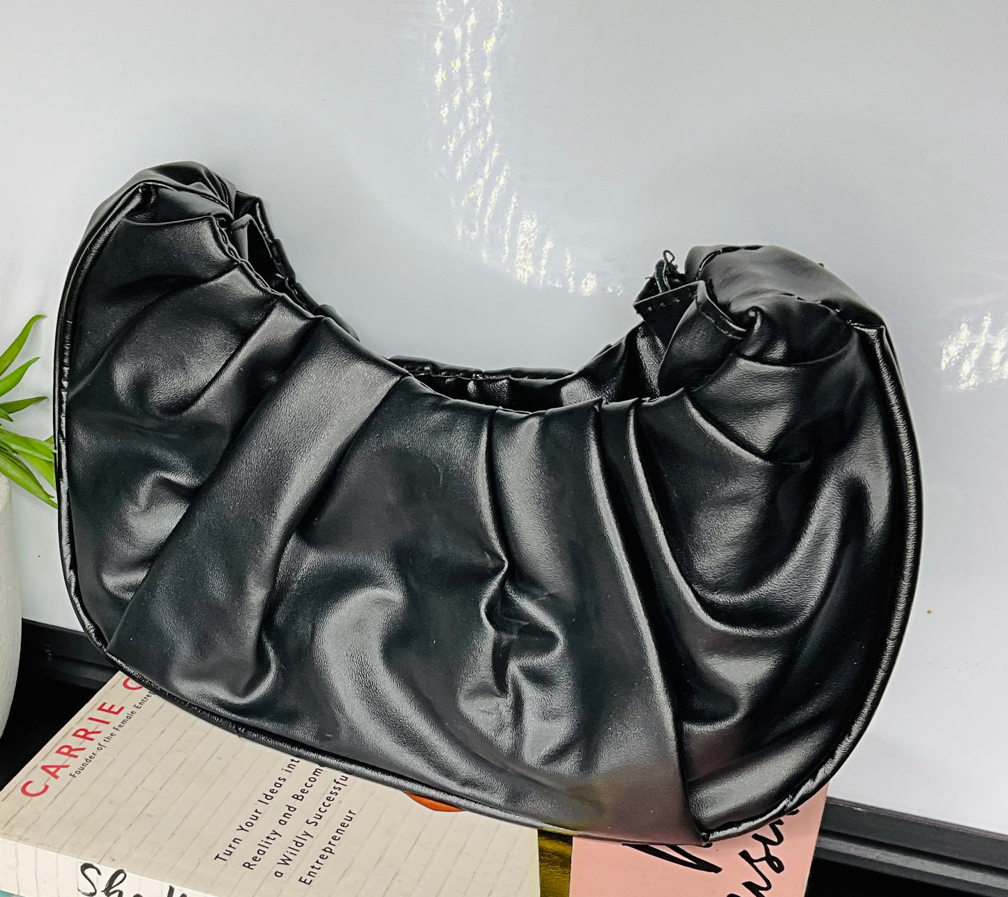 crescent-shaped hobo bag
