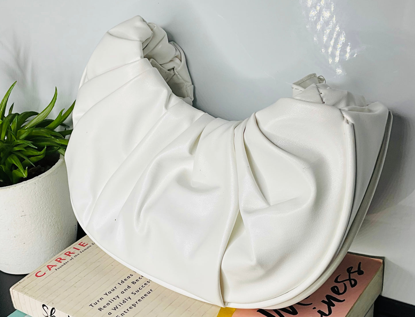 crescent-shaped hobo bag